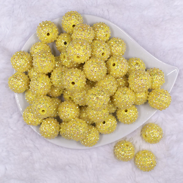 Top view of a pile of 20mm Yellow Flower Rhinestone Bubblegum Beads