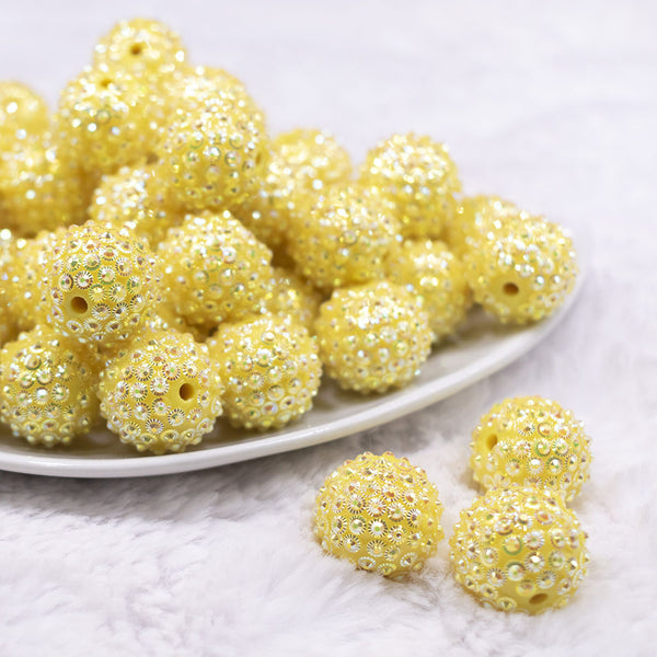 Front view of a pile of 20mm Yellow Flower Rhinestone Bubblegum Beads