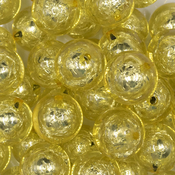 close up view of a pile of 20mm Yellow Foil Bubblegum Beads