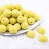 Front view of a pile of 20mm Yellow Sugar Glass Bubblegum Beads