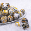 front view of a pile of 20mm Yellow Marbled Bubblegum Beads