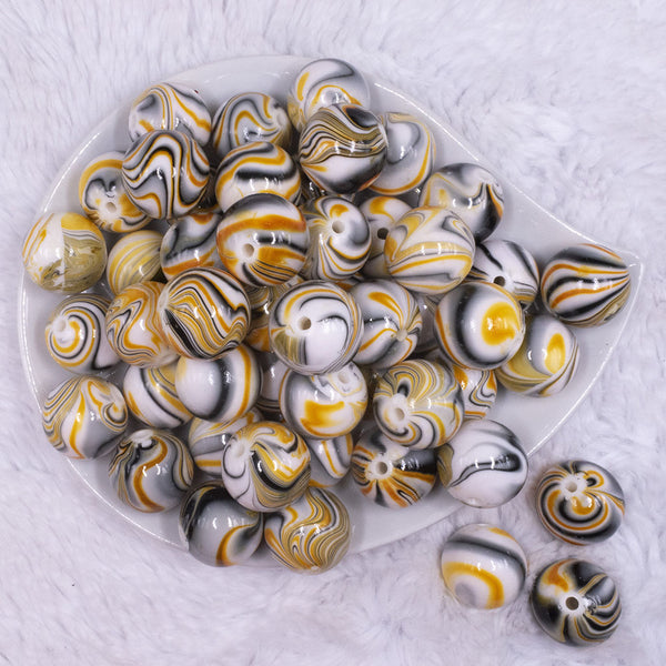 top view of a pile of 20mm Yellow Marbled Bubblegum Beads