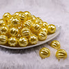 Front view of a pile of 20mm Yellow Pearl Pumpkin Shaped Bubblegum Bead