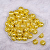 Top view of a pile of 20mm Yellow Pearl Pumpkin Shaped Bubblegum Bead