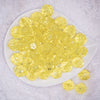 top view of a pile of 20mm Yellow Transparent Faceted Bubblegum Beads