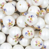 Close up image of a pile of 20mm Baby Shark Print Chunky Acrylic Bubblegum Beads