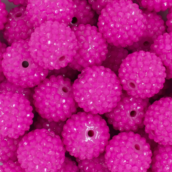 Close up view of a pile of 20mm Bright Pink Rhinestone Chunky Bubblegum Beads