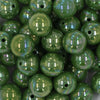 Close up view of a pile of 20mm Dark Green Solid AB Bubblegum Beads