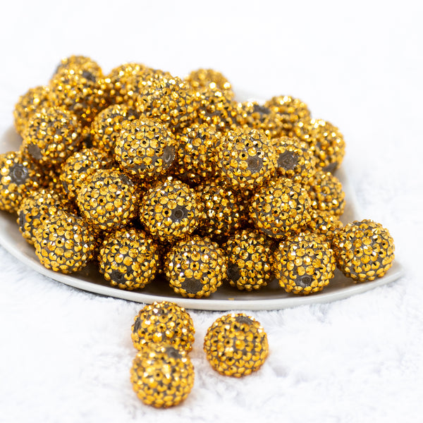 Front view of a pile of 20mm Gold Rhinestone AB Bubblegum Beads