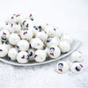 Front picture of a pile of 20mm Harry Potter Print Chunky Acrylic Bubblegum Beads