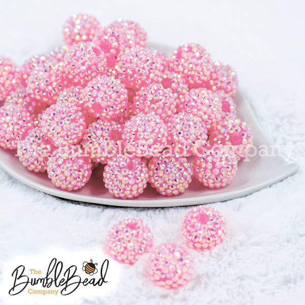 Front view of a pile of 20mm Jelly Pink Rhinestone AB Bubblegum Beads