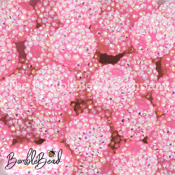 Close up view of a pile of 20mm Jelly Pink Rhinestone AB Bubblegum Beads