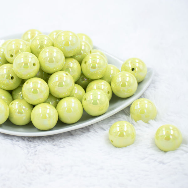 Front view of a pile of 20mm Lime Green Solid AB Bubblegum Beads