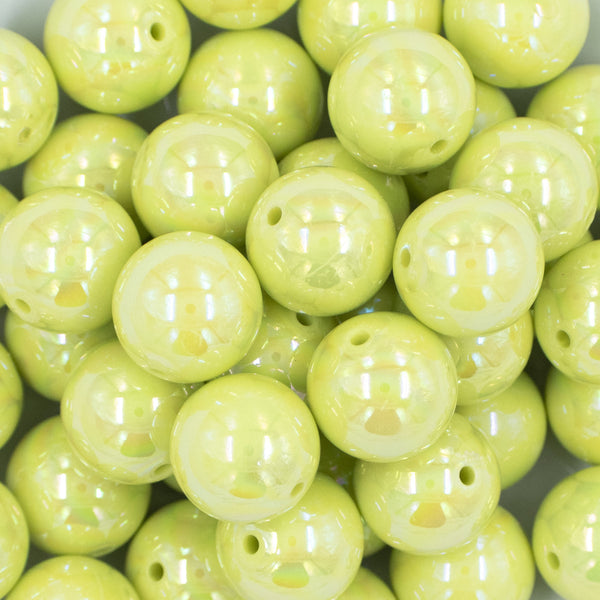 Close up view of a pile of 20mm Lime Green Solid AB Bubblegum Beads