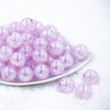Front view of a pile of 20mm Light Purple Crackle AB Bubblegum Beads