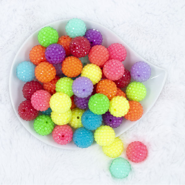 Top view of a pile of 20mm NEON Rhinestone Clear Mix Acrylic Bubblegum Beads Bulk [100 Count]