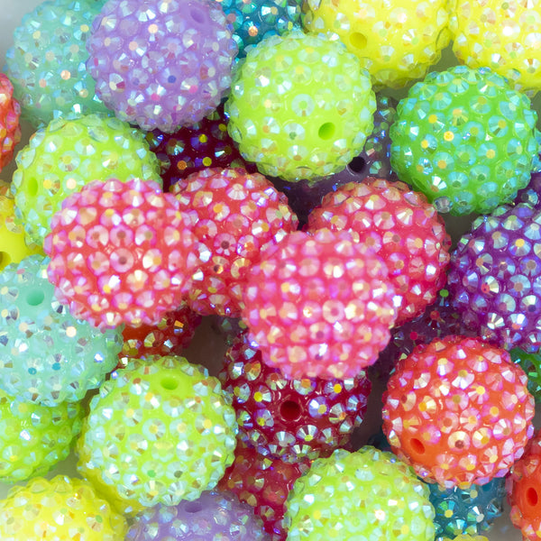 Close up view of a pile of 20mm NEON Rhinestone AB Mix Acrylic Bubblegum Beads Bulk [100 Count]