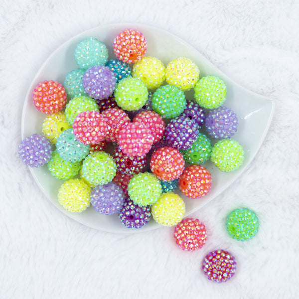 Top view of a pile of 20mm NEON Rhinestone AB Mix Acrylic Bubblegum Beads Bulk [100 Count]