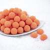 Front view of a pile of 20mm Ball Bead Orange Bubblegum Beads