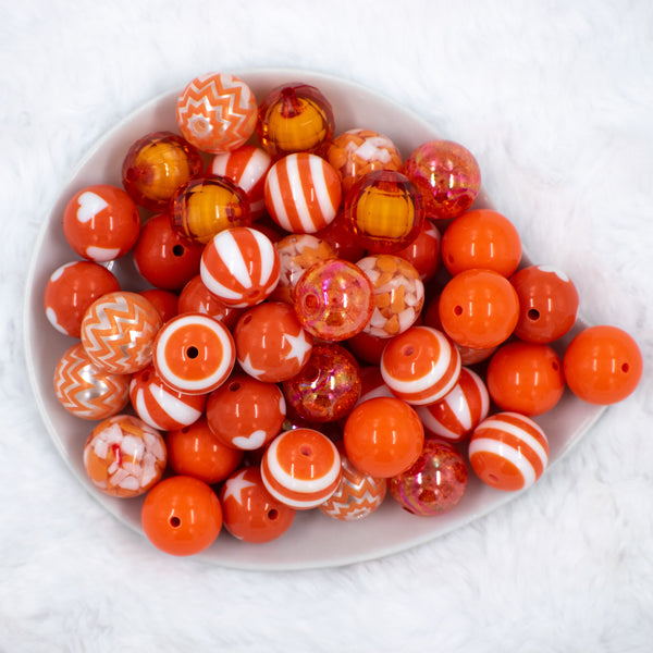 Top view of a pile of Orange Crush bubblegum bead mix