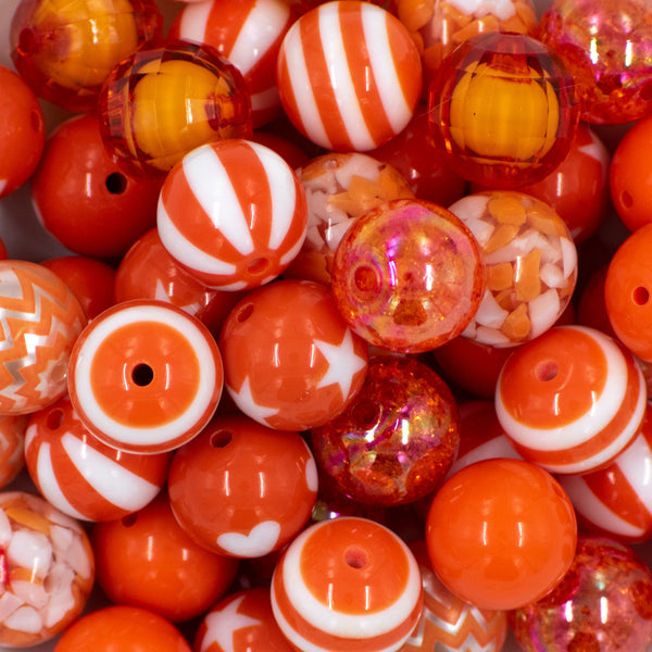 Close up view of a pile of 20mm Orange Crush Chunky Acrylic Bubblegum Bead Mix [50 Count]