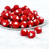 front view of a pile of 20mm Red with White Hearts Acrylic Bubblegum Beads