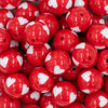 close up view of a pile of 20mm Red with White Hearts Acrylic Bubblegum Beads