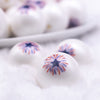Macro view of a pile of 20mm Patriotic Starburst Fireworks Print Chunky Acrylic Bubblegum Beads [10 Count]