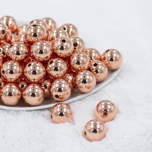 Front view of a pile of 20mm Reflective Rose Gold Acrylic Bubblegum Beads