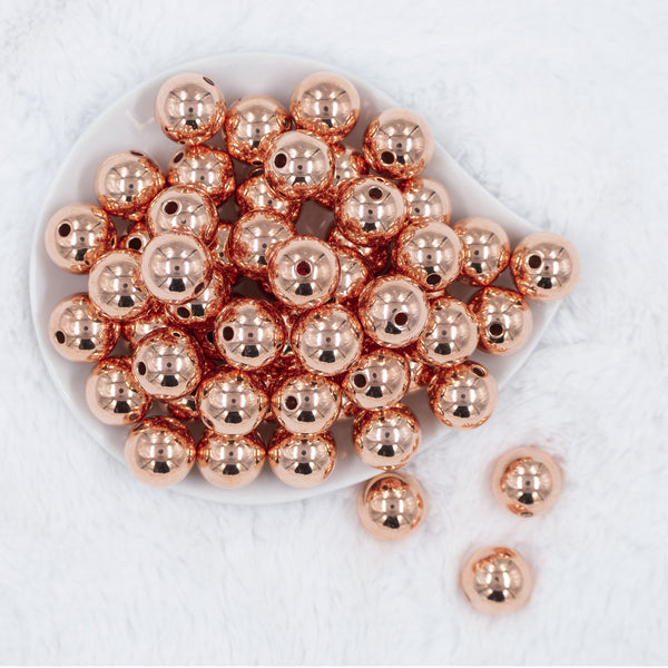 Top view of a pile of 20mm Reflective Rose Gold Acrylic Bubblegum Beads