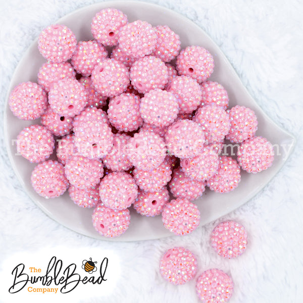 Top view of a pile of 20mm Solid Light Pink Rhinestone AB Bubblegum Beads