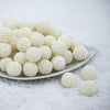 Front view of a pile of 20mm Ball Bead White Bubblegum Beads