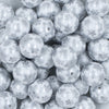 Close up view of a pile of 20mm Silver Snowflake Print on White Acrylic Bubblegum Beads