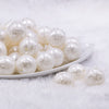 Front view of a pile of 20mm White Lace Bubblegum Beads