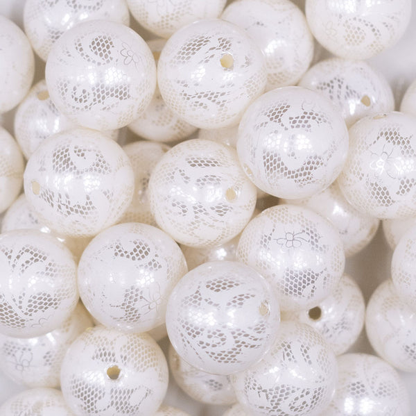 Close up view of a pile of 20mm White Lace Bubblegum Beads