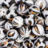 close up view of a pile of 20mm Snow Leopard Animal Print Acrylic Bubblegum Beads