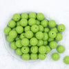 Top view of a pile of 20mm Apple Green Solid Acrylic Chunky Bubblegum Beads