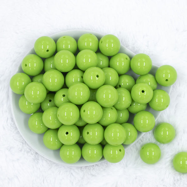 Top view of a pile of 20mm Apple Green Solid Acrylic Chunky Bubblegum Beads