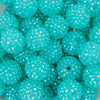 zoomed view of a pile of 20mm Chunky Bubblegum Beads in a Aqua Blue with prism Rhinestone finish