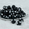 front of a pile of 20mm Black with White Hearts Bubblegum Beads