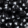 close up of a pile of 20mm Black with White Hearts Bubblegum Beads