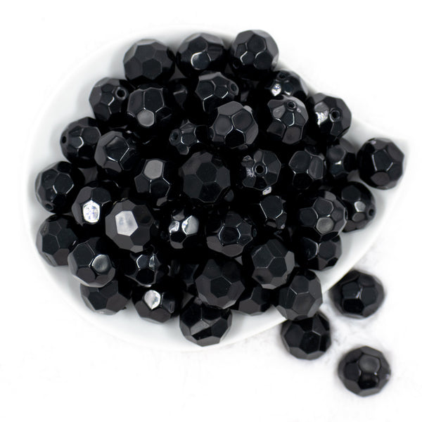 top view of a pile of 20mm Black Faceted Bubblegum Beads