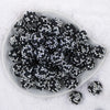 Top view of a pile of 20mm Black & Silver Confetti Rhinestone AB Bubblegum Beads