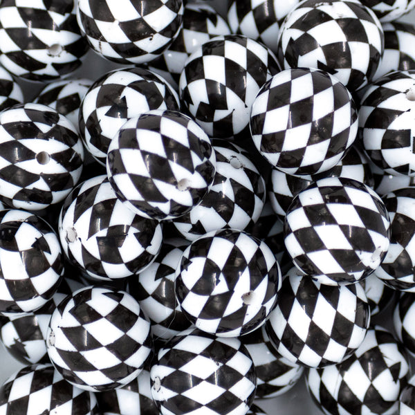 close-up view of many 20mm Black and White Diamond Print Chunky Acrylic Bubblegum Beads