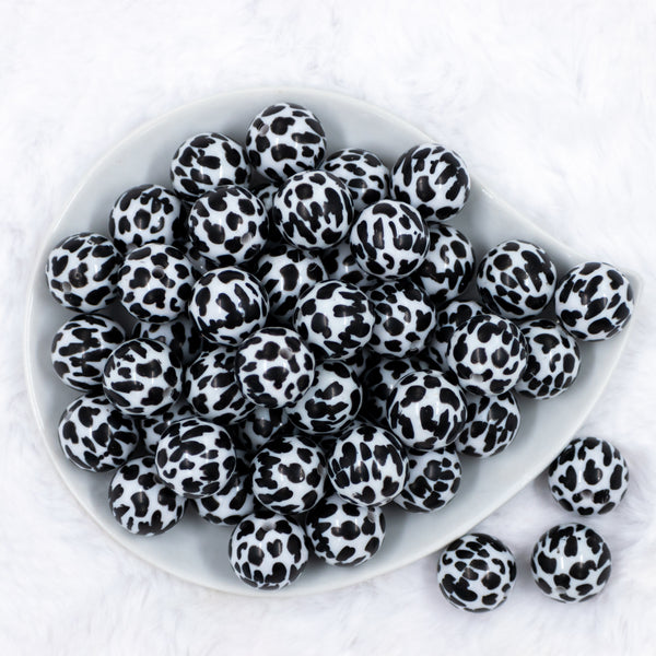 top of a pile of 20mm Black & White Cow Animal Print Bubblegum Beads