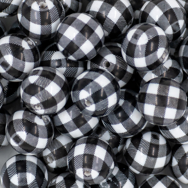 close-up view of a many 20mm Black & White Plaid Print Chunky Acrylic Bubblegum Beads