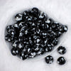top of a pile of 20mm Black Tablet Bubblegum Beads