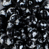 close up of a pile of 20mm Black Tablet Bubblegum Beads