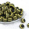 Front view of a pile of 20mm Yellow & Black Striped Chunky Bubblegum Beads