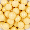 close-up of a pile of 20mm Solid colored Blonde Yellow Shiny Beads